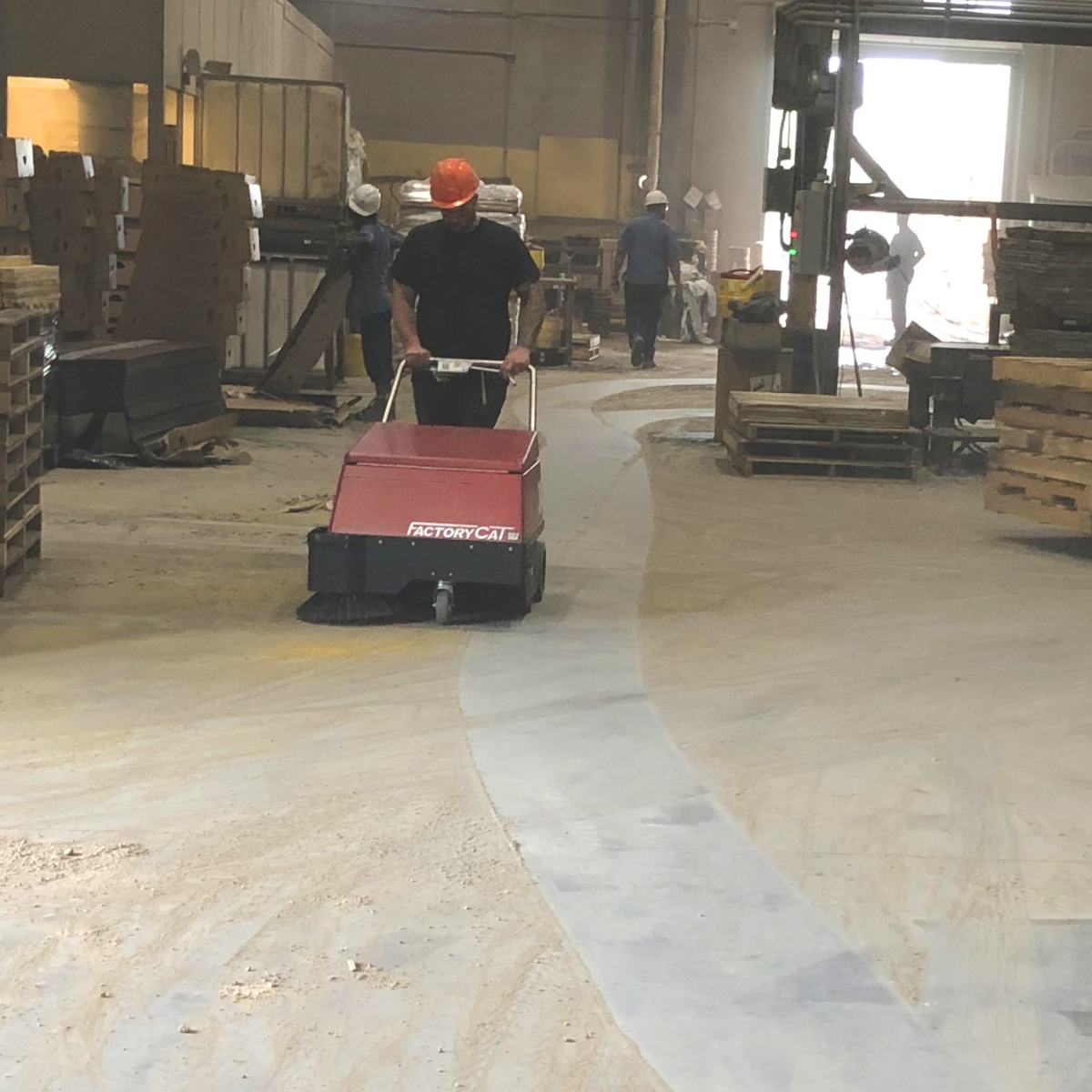 Factory Cat's Floor Sweepers are built to sweep factories: dirt, dust, metal shavings, foundry sand, bolts, paper, wood, whatever there is. Factory Cat's are compact, not light-duty.